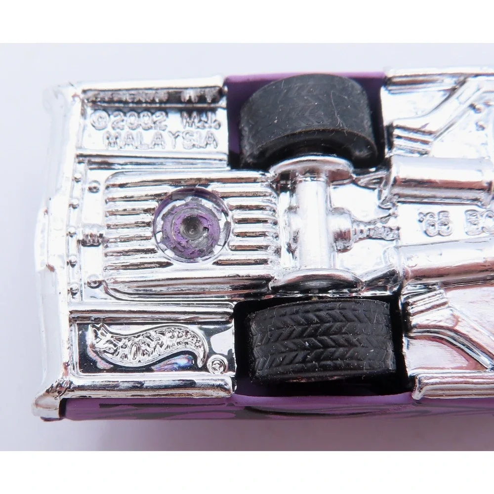 Hot Wheels 2004 Treasure Hunt 65 Bonneville Purple Matte Flames Real Riders 1:64